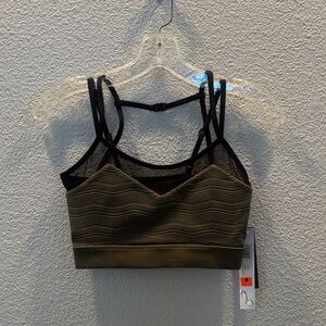 Danz N Motion- Olive and Black Sports Bra. Has mesh detail and striped pattern